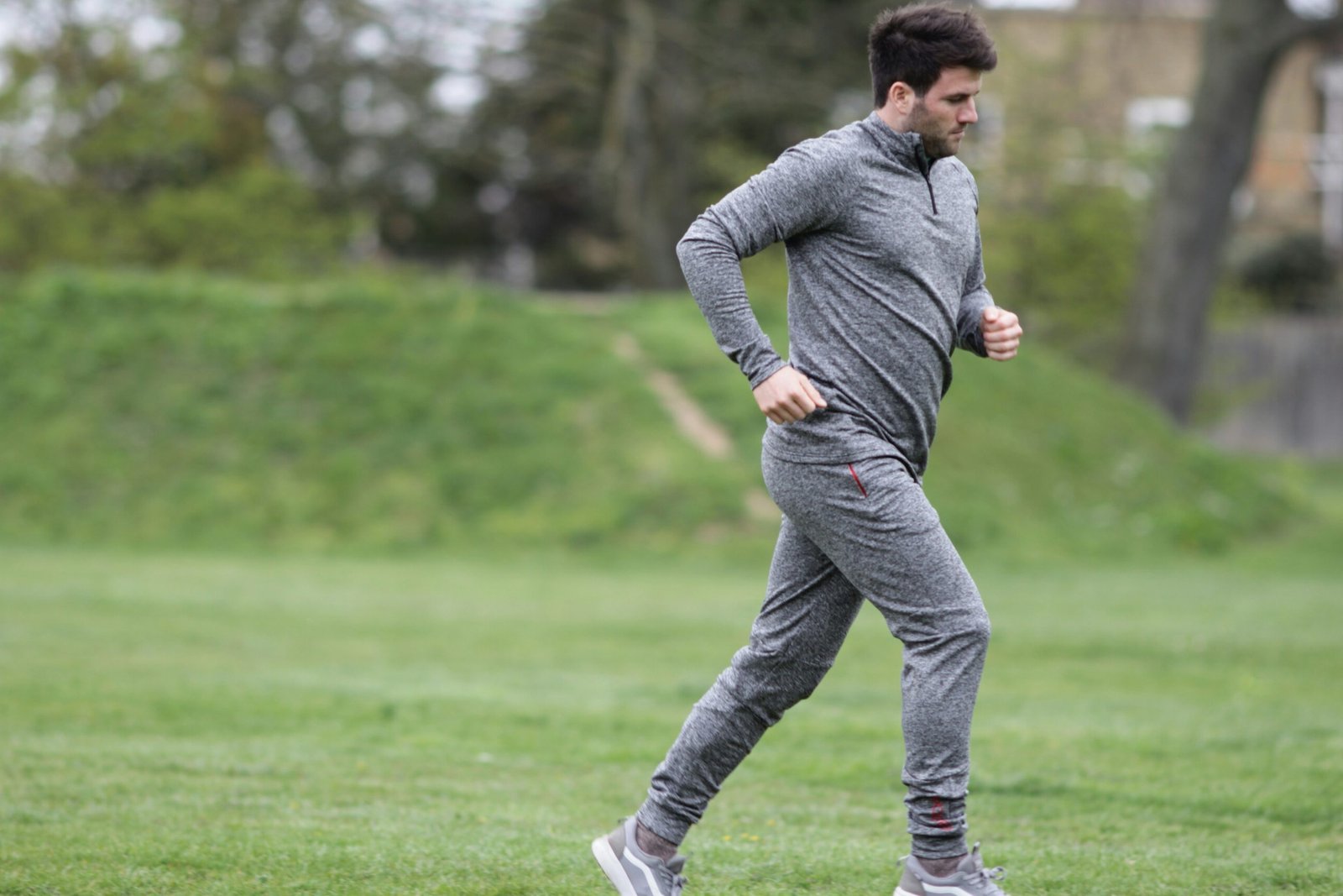 unknown celebrity running outdoors